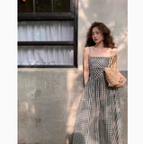 and white plaid suspender dress with slim waist and French retro temperament medium-length skirt HZ1024